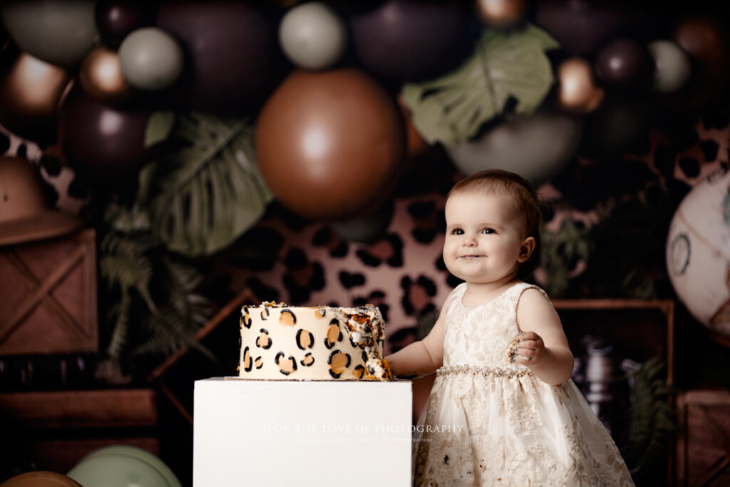 Lansing Cake Smash Photographer Toddler Smiling by For The Love of Photography