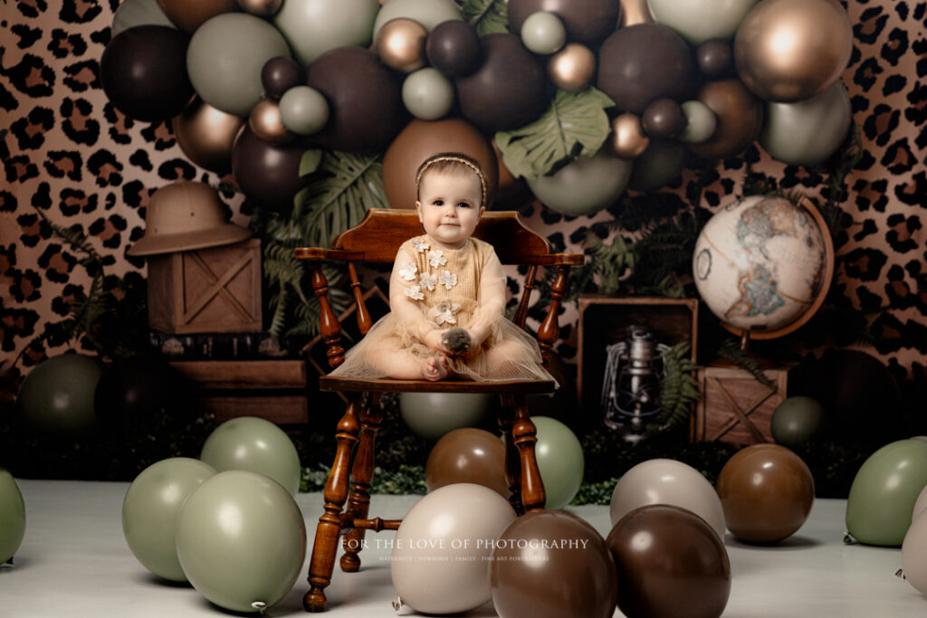 Lansing Cake Smash Photographer Toddler on Chair by For The Love of Photography