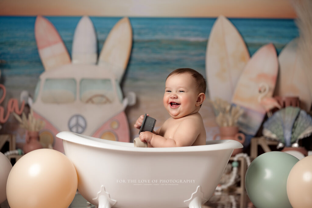 Baby splashing in tub